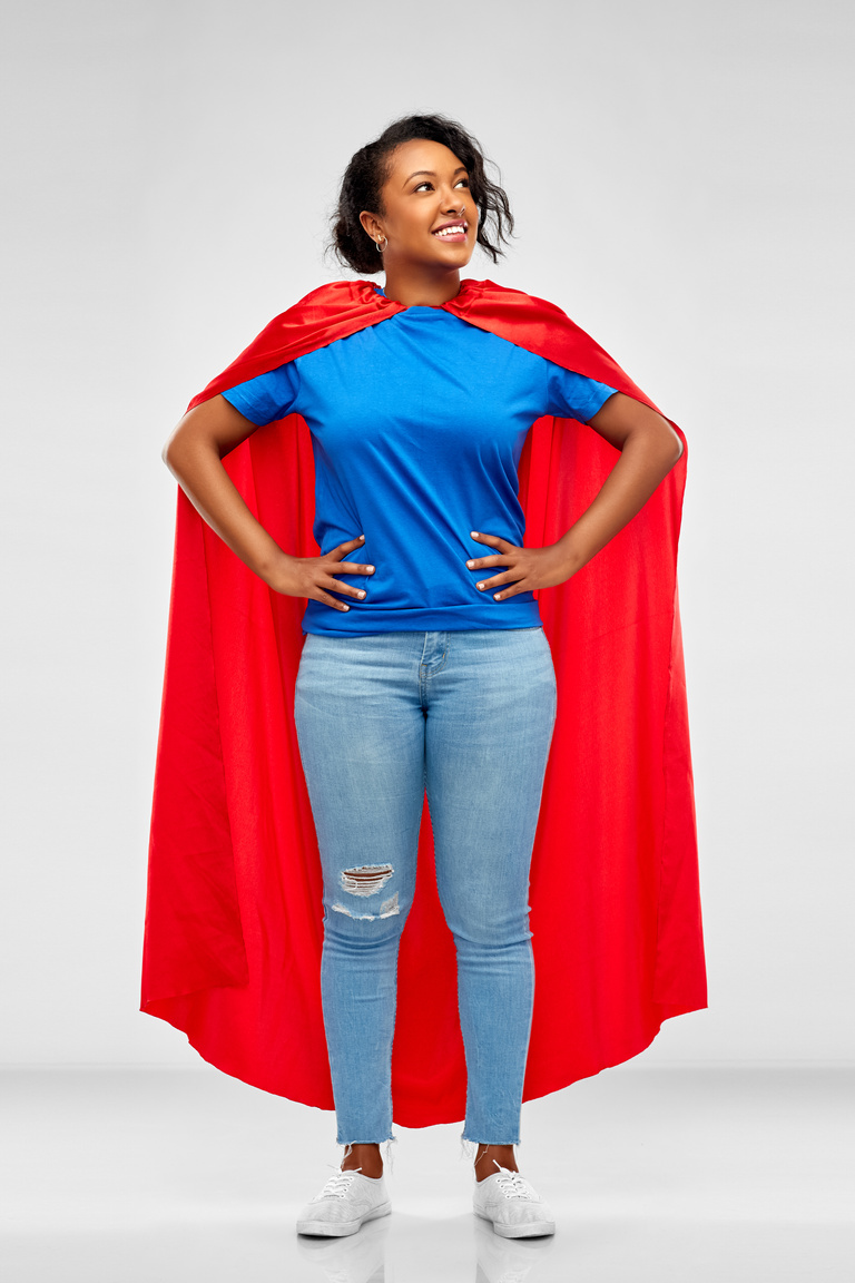 Happy African American Woman in Superhero Red Cape