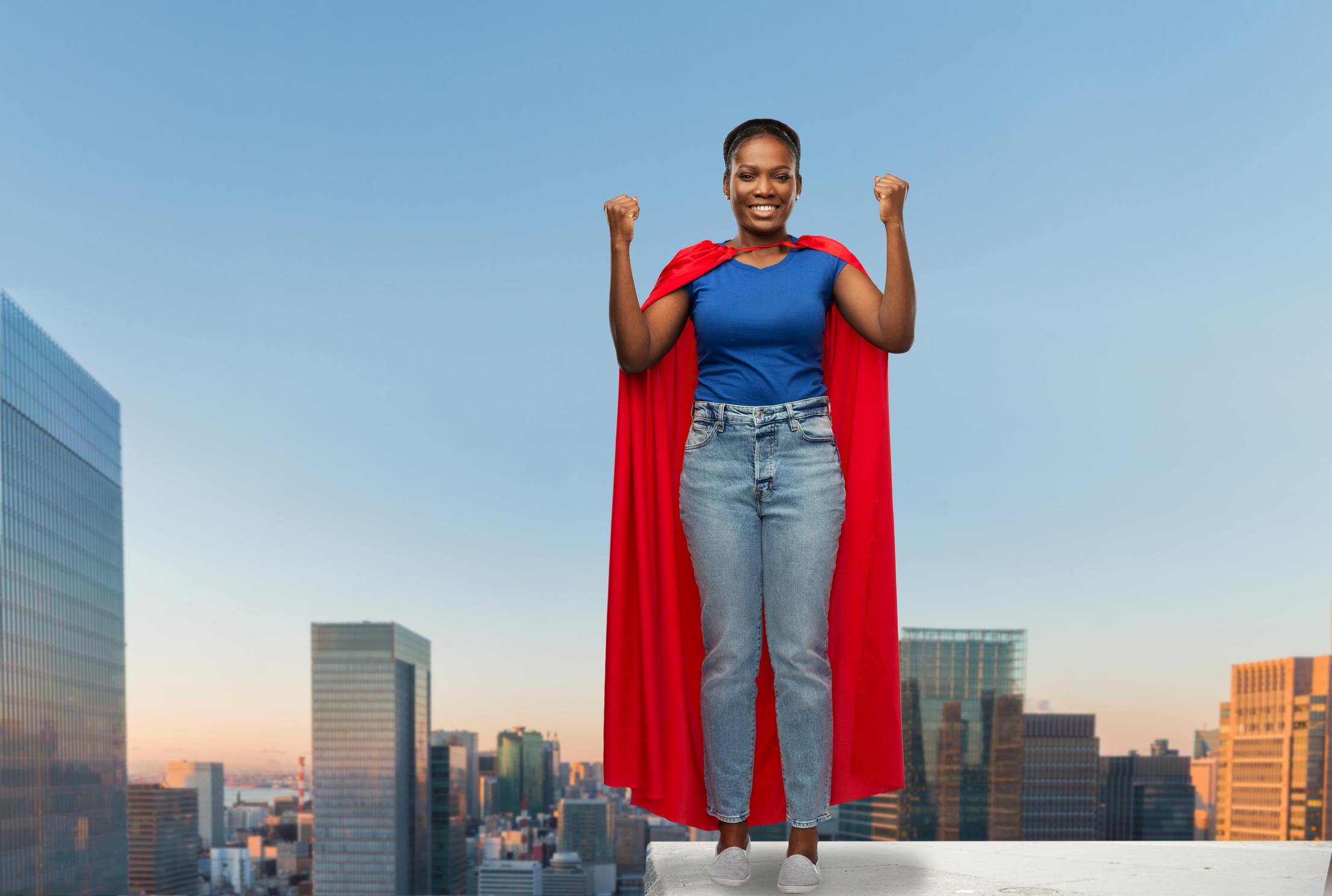 Happy African American Woman in Red Superhero Cape